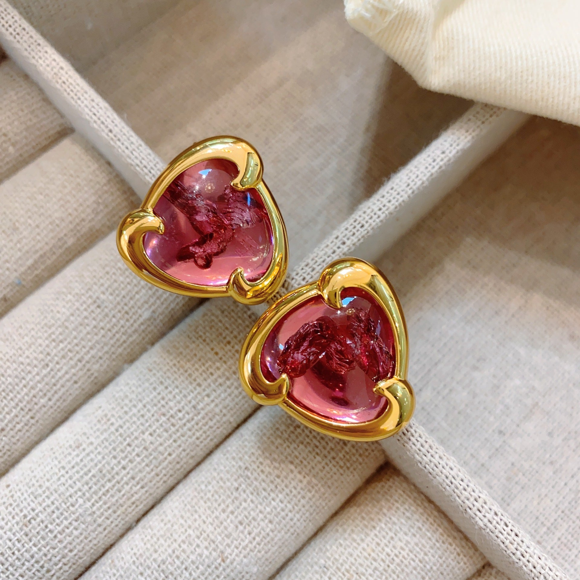 Ancient Babylon Heavy Industries gilt colored treasure earrings antique feeling plated 22K gold melted glazed triangular stud earrings