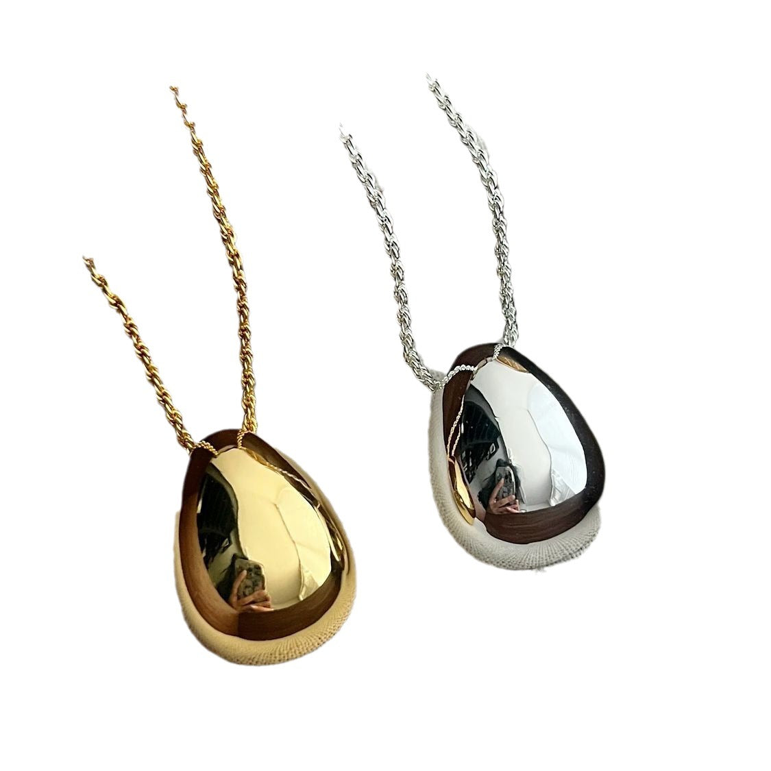 French retro European and American niche design egg-shaped water drop pendant necklace minimalist premium cold wind silver egg sweater chain