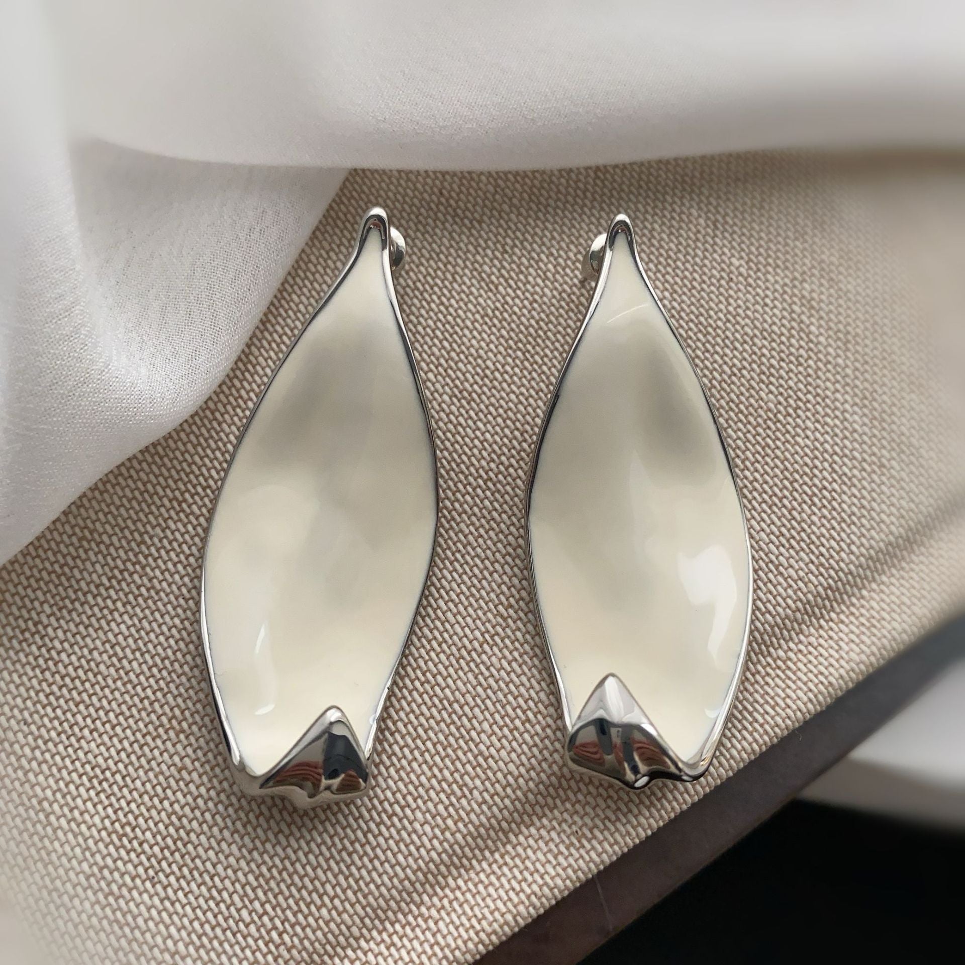 White enamel oil drop color leaf roll gold-plated design stud earrings light luxury niche light luxury plant series versatile earrings women