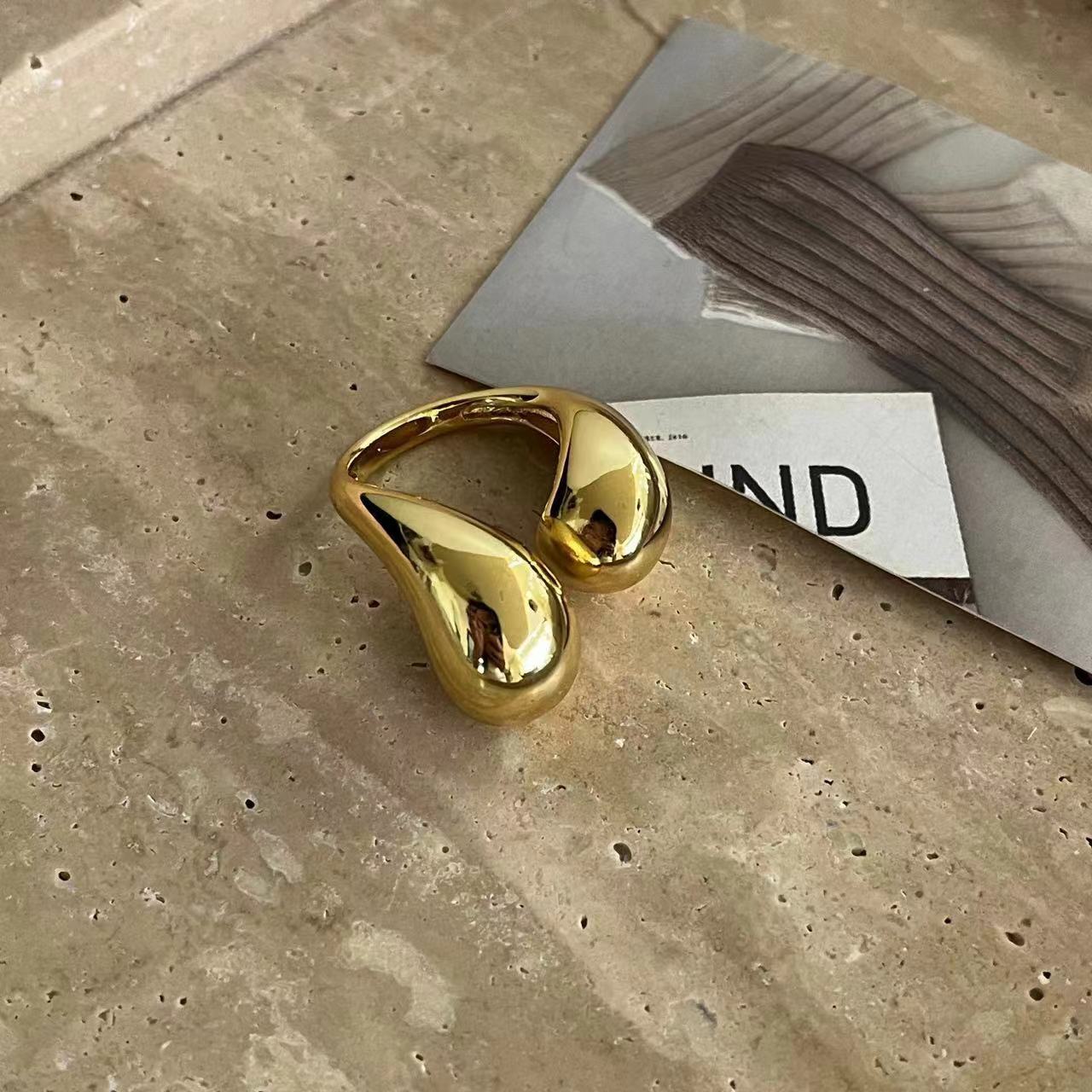 Niche exaggerated mirror metal double water drop open ring fashion high sense European and American light luxury personality ring women