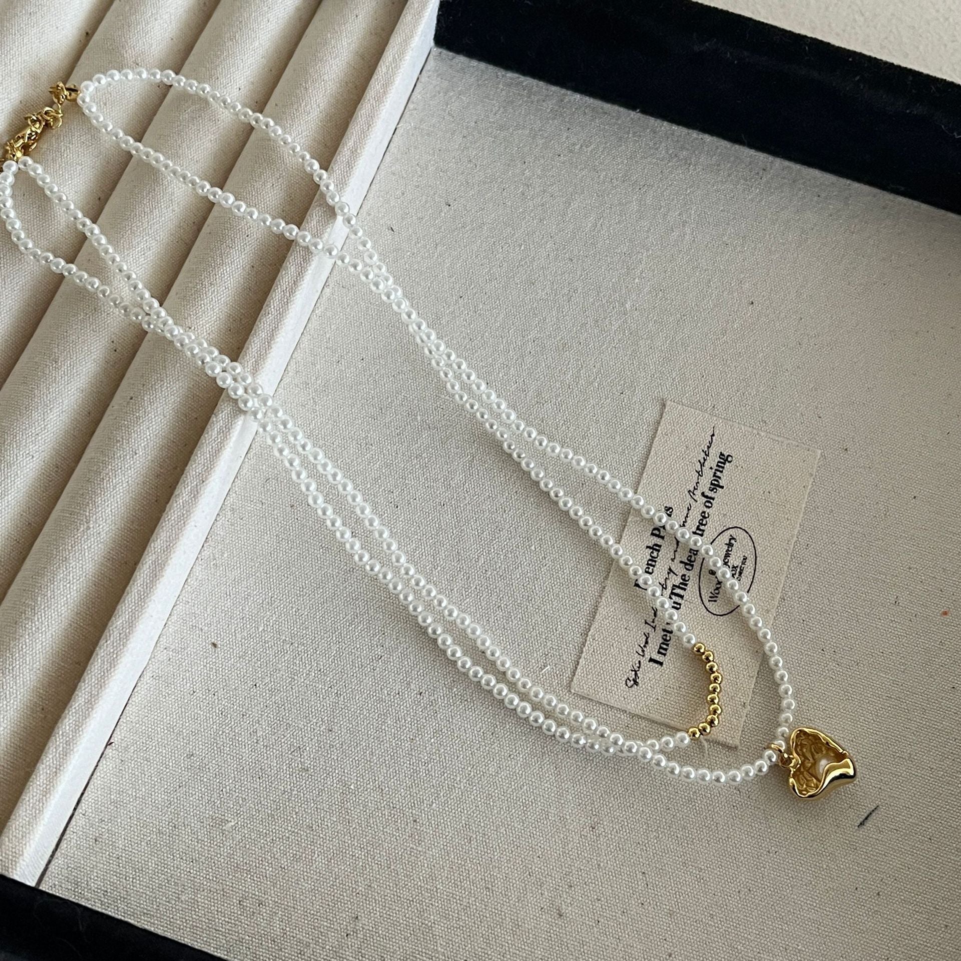 Small rice grain double-layer love pearl necklace women's 2024 niche new popular pendant collarbone chain high-end neck chain