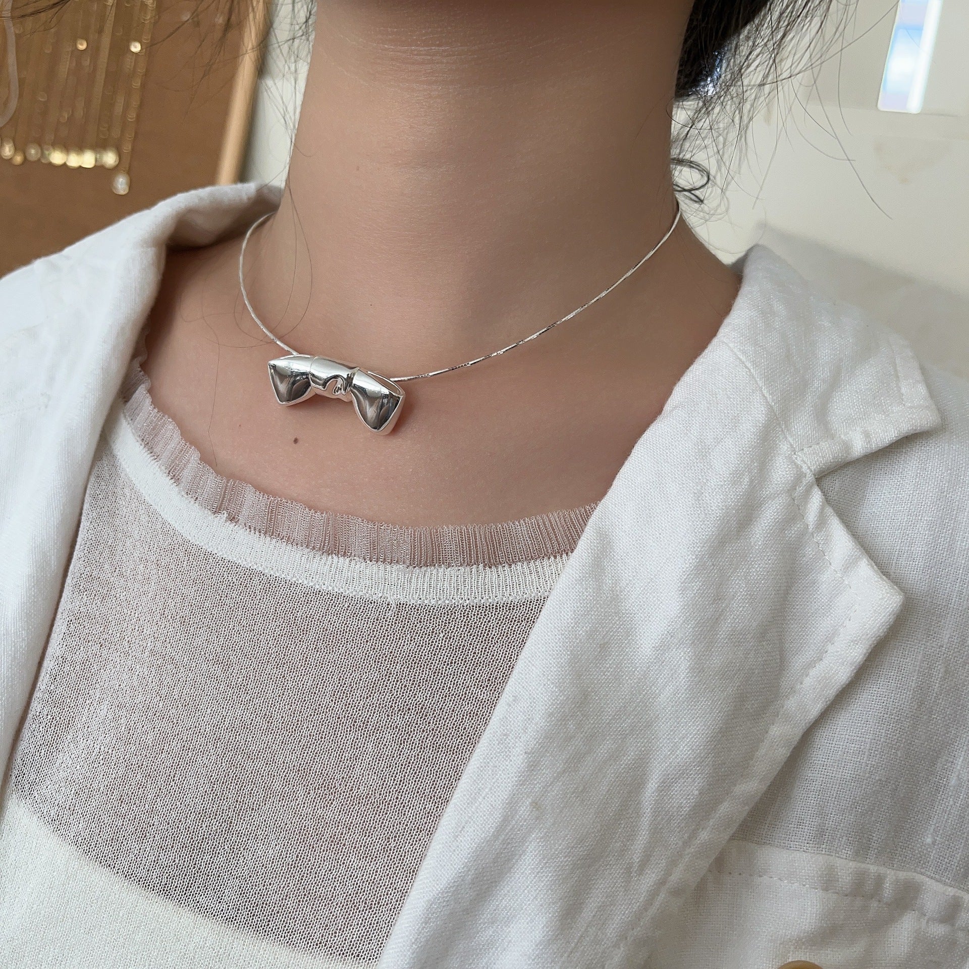 Cold wind bow necklace pendant collarbone chain women's simple short sweet versatile Japanese and Korean version birthday gift