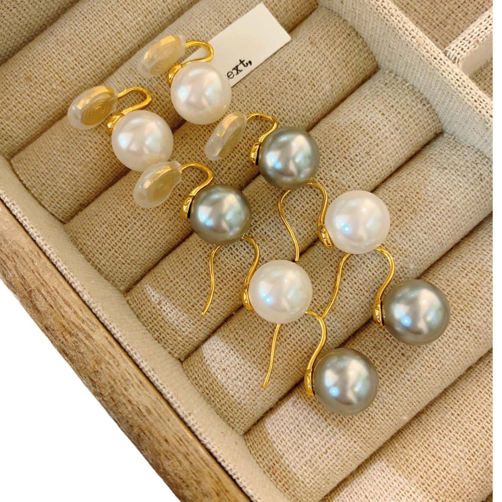 Shi Jiaping for pearl ear clips without ear piercings, light luxury, niche design sense, advanced mosquito coil disc, ear bone clip, earrings, studs.