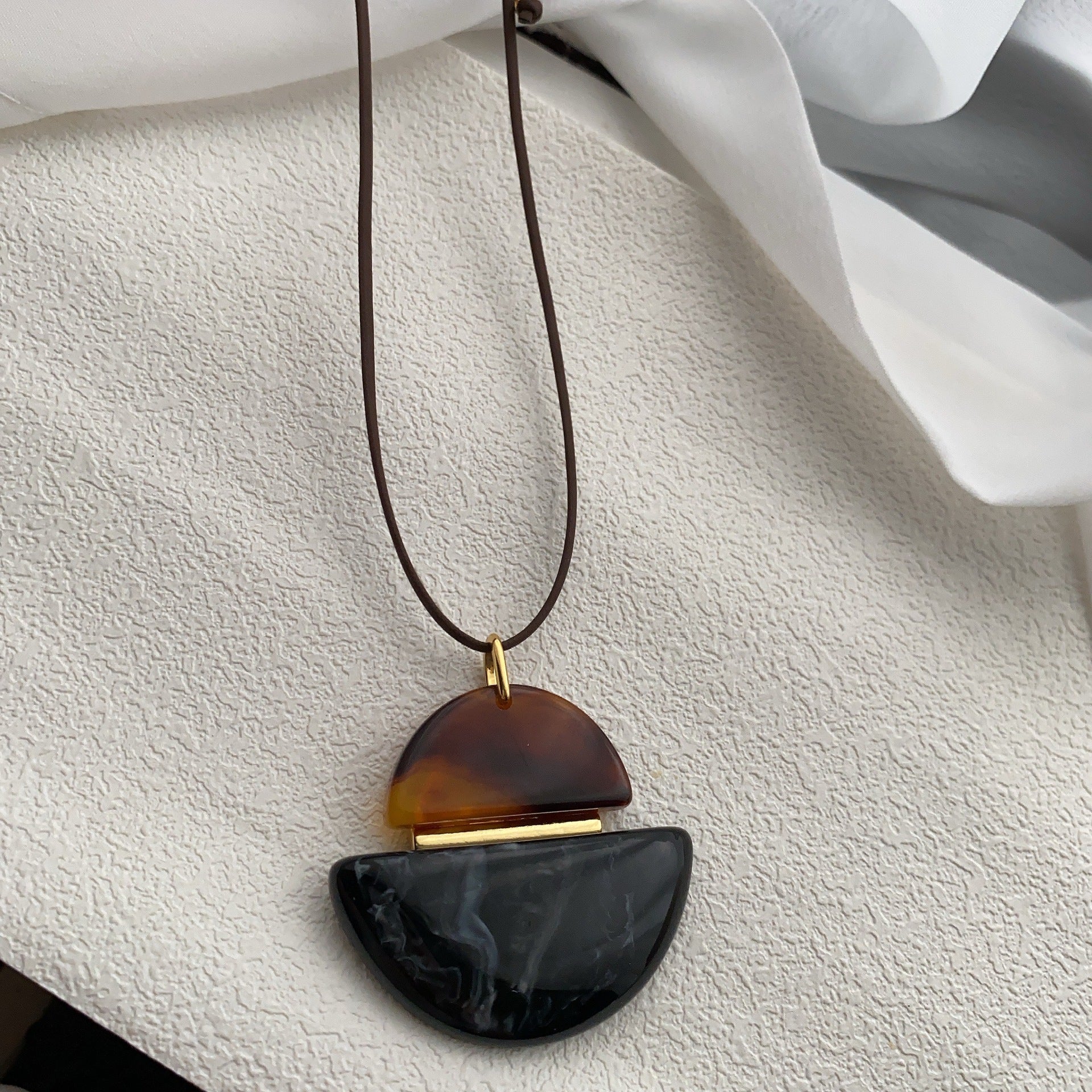 Korean amber resin pendant, black rope necklace, women's simple niche fashion commuter temperament versatile neck chain sweater