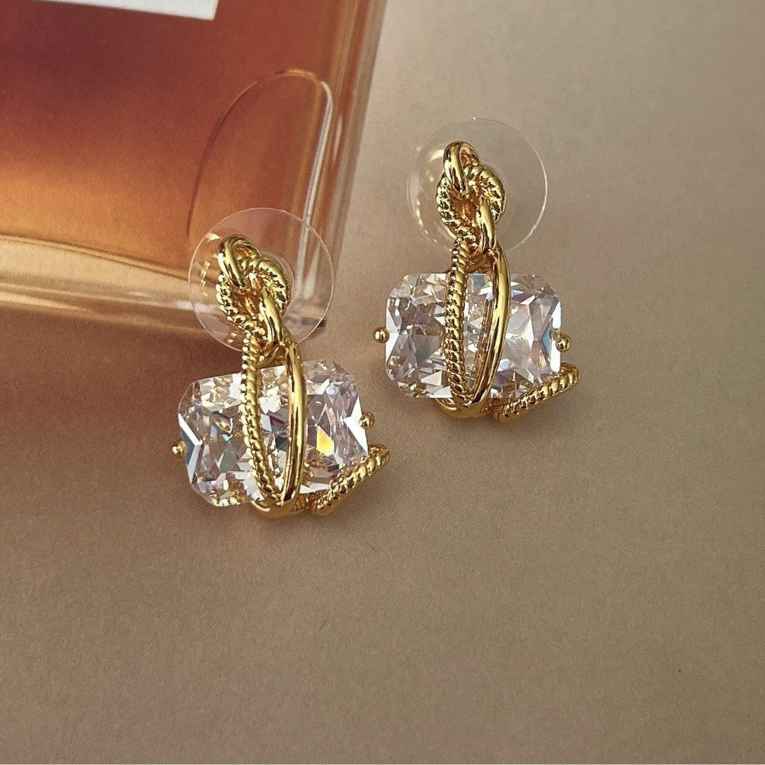 Niche design sense personalized knot gem earrings 2024 new light luxury niche high-end stud earrings