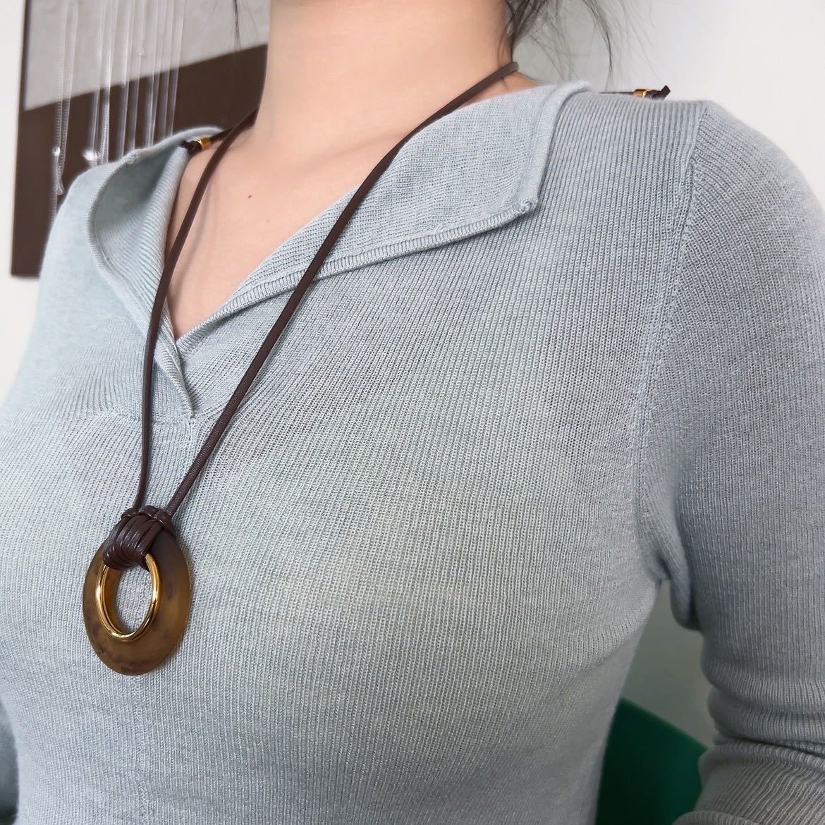 Autumn and winter new retro national style new Chinese style with sweater elegant classical long sweater chain men and women with the same pendant