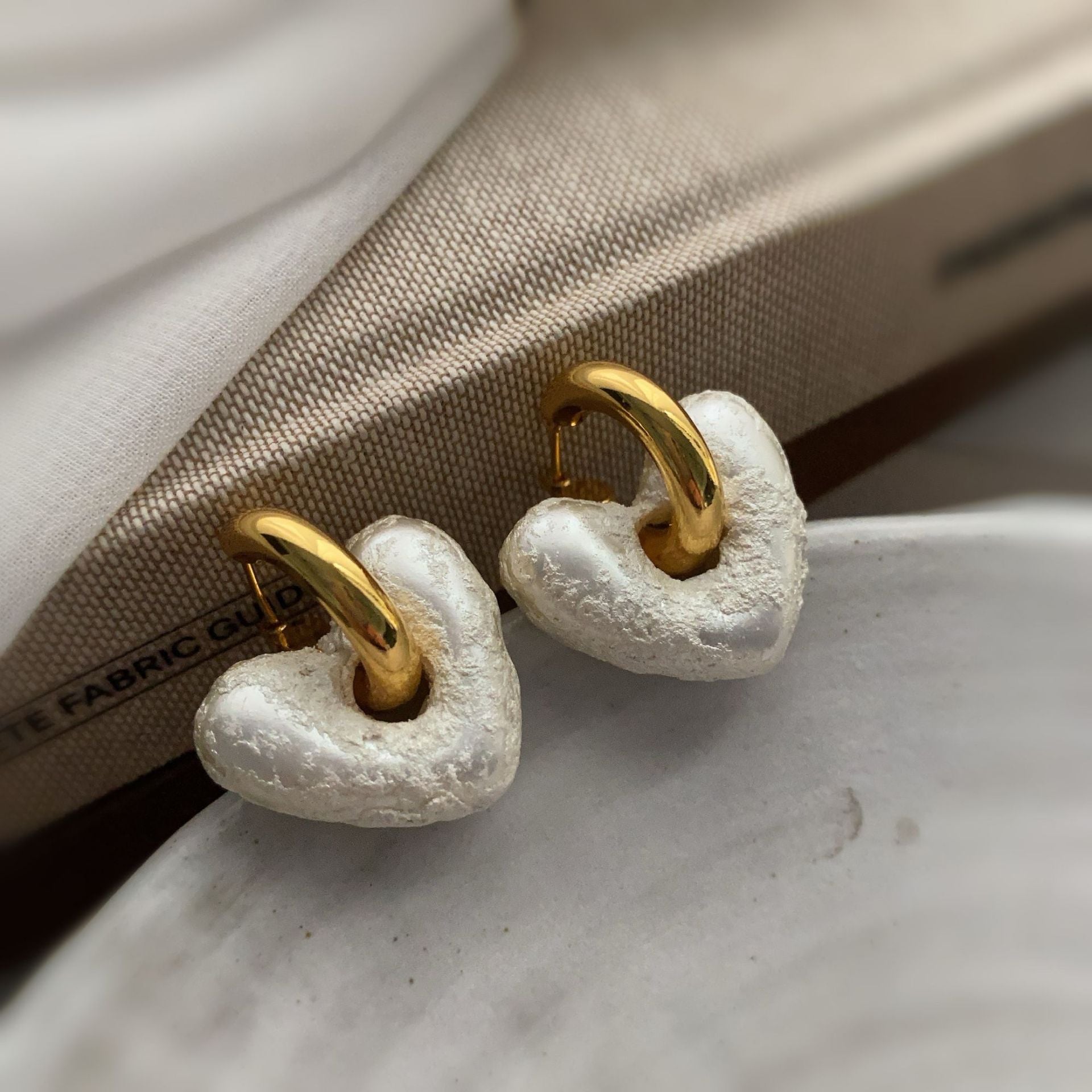 Autumn and winter new natural resin stud earrings milk white temperament niche design love shape ear buckle versatile earrings women